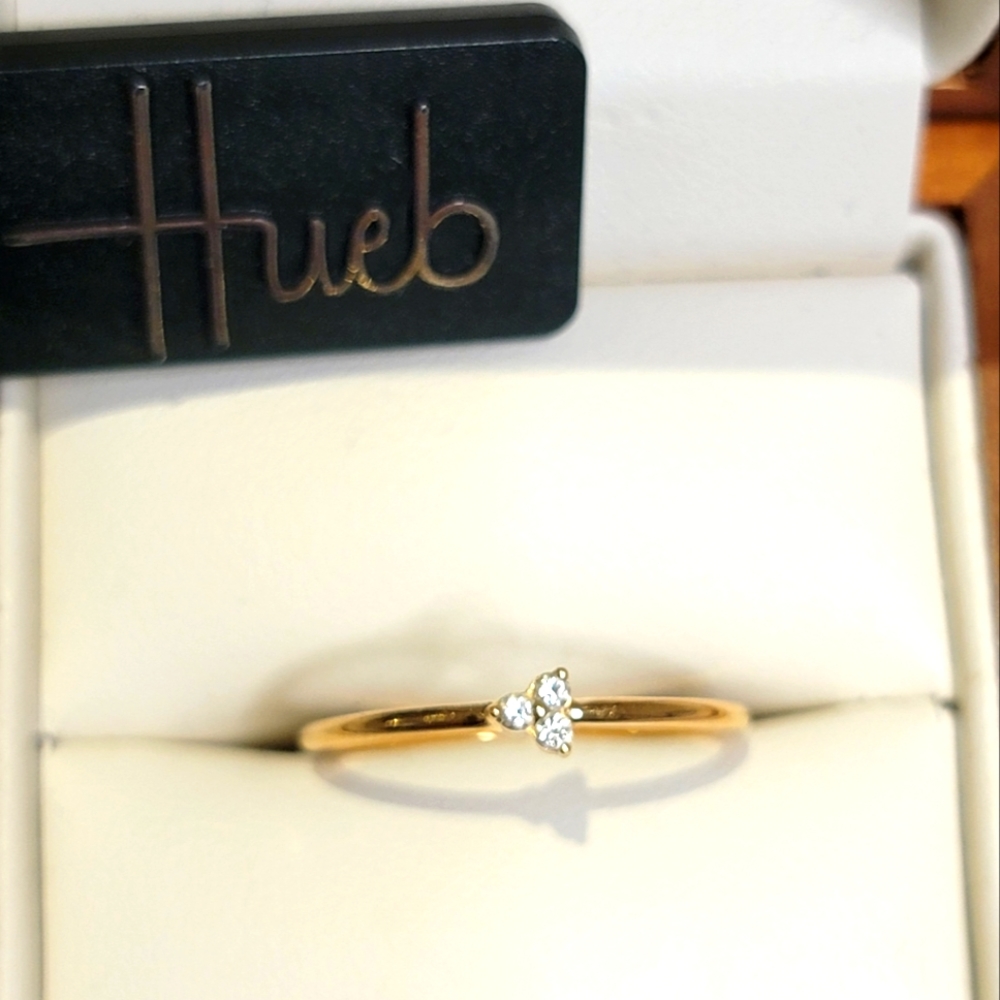 18k yellow gold Hueb designer ring with tags.